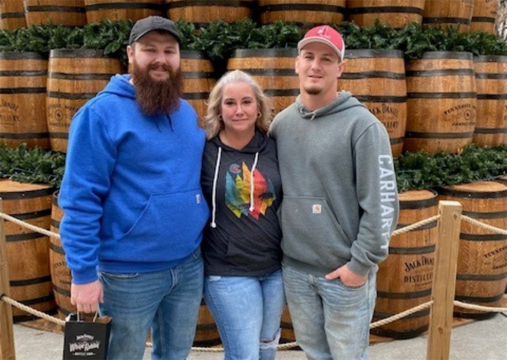 Mary Datz, Customer Service Representative, with her two sons, Joe (left) and Jake.